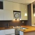 Acabamento em Vidro Branco: permite compor projetos modernos e inovadores em cozinhas integradas à outros ambientes.