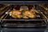 Espetos Giratórios: permitem assar alimentos maiores de forma mais homogênea ao usar o grill infravermelho em ambos os fornos principal e auxiliar.
