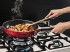 Suporte de Panelas Wok: proporciona melhores resultados culinários ao utilizar o queimador triplo no preparo de receitas orientais de forma fácil e segura.